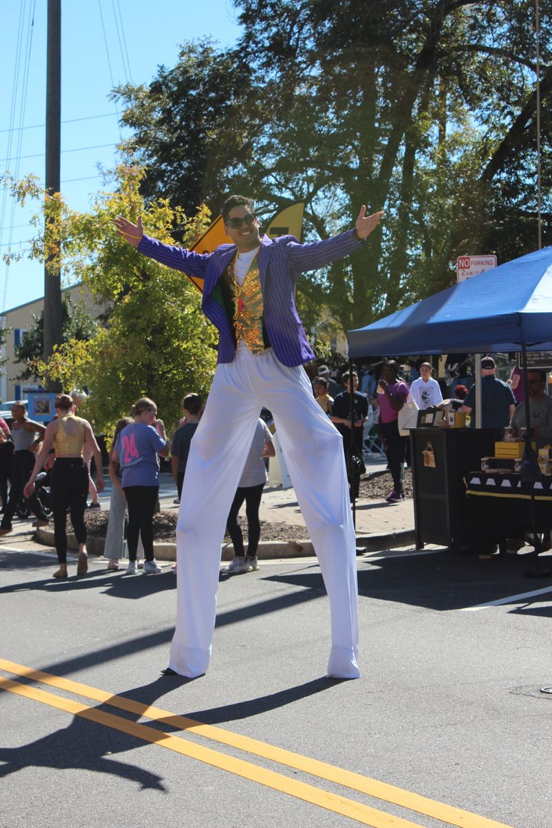Stilt walker entertaining the festival crowd